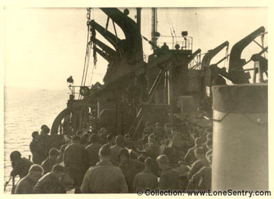 [305th Engineers Bn., 80th Infantry Division, on ship near Normandy, France]