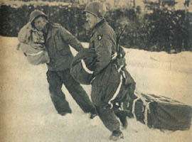 [101st Airborne Division: GIs retrieve supply bundles dropped by parachute]